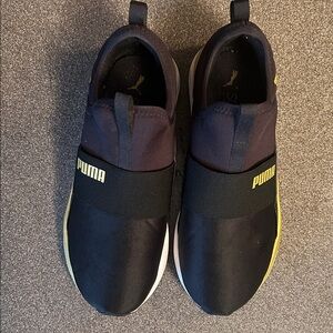 Puma Soft Ride sneakers. Size 8. Black, gold accents, white sole. EUC